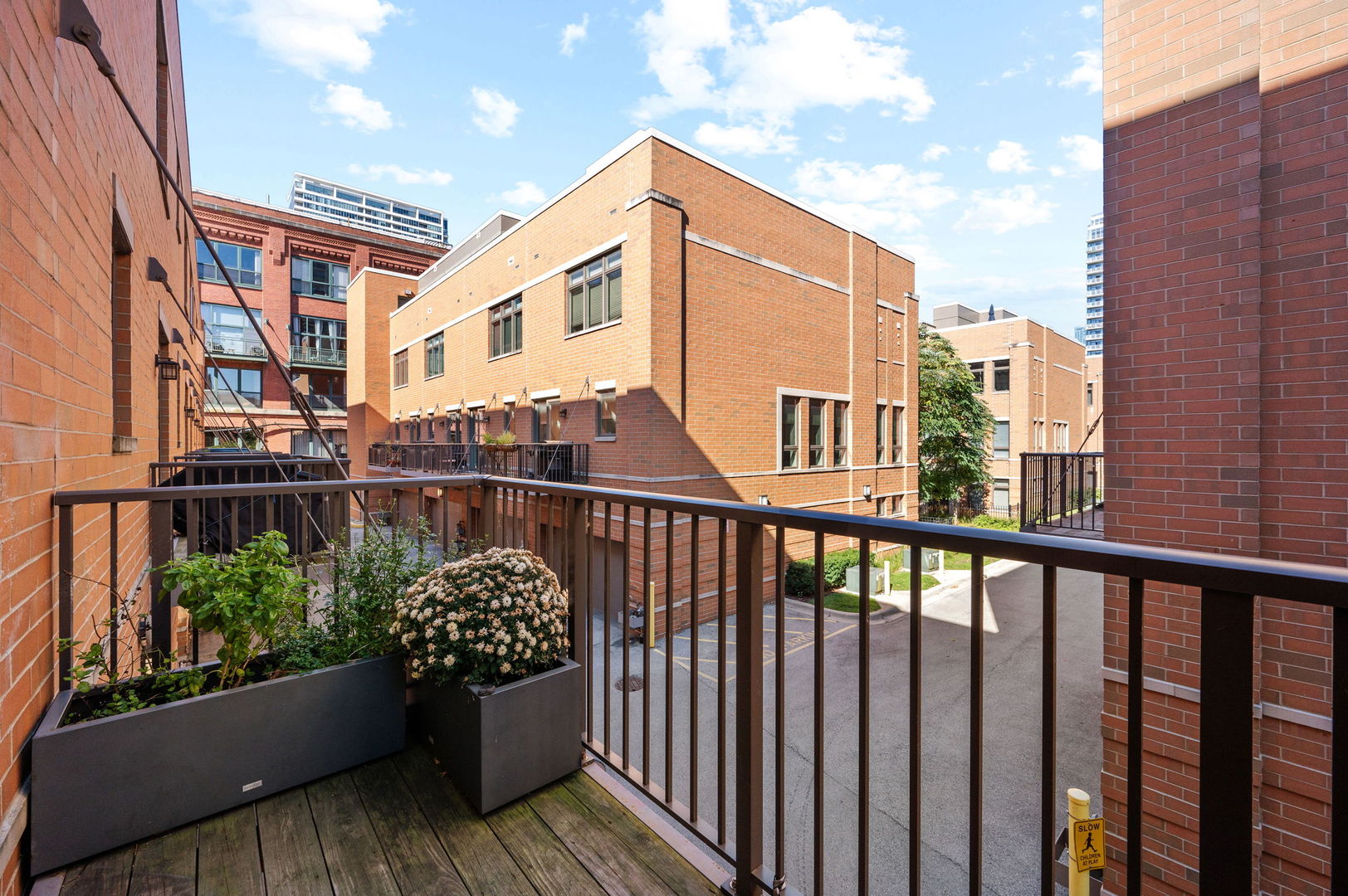 232 East 18th Street Chicago, IL 60616 - Photo 14 of 39 a view of a two chairs and table in the balcony