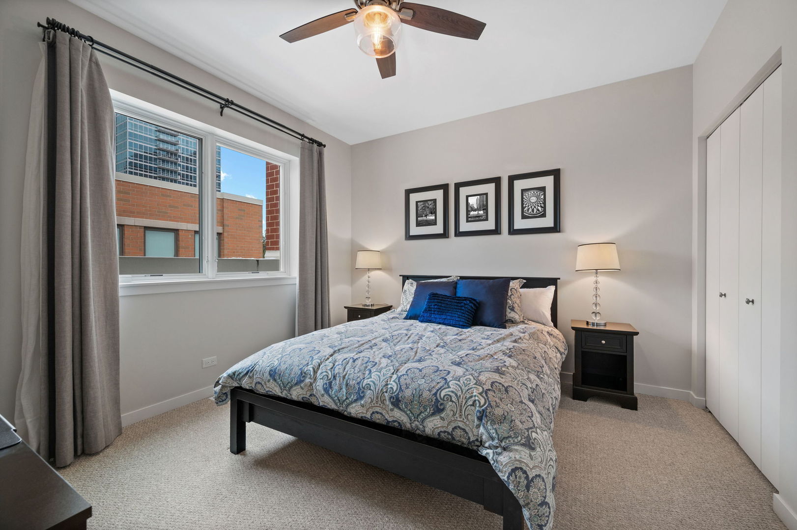 232 East 18th Street Chicago, IL 60616 - Photo 29 of 39 a bedroom with a bed and a window