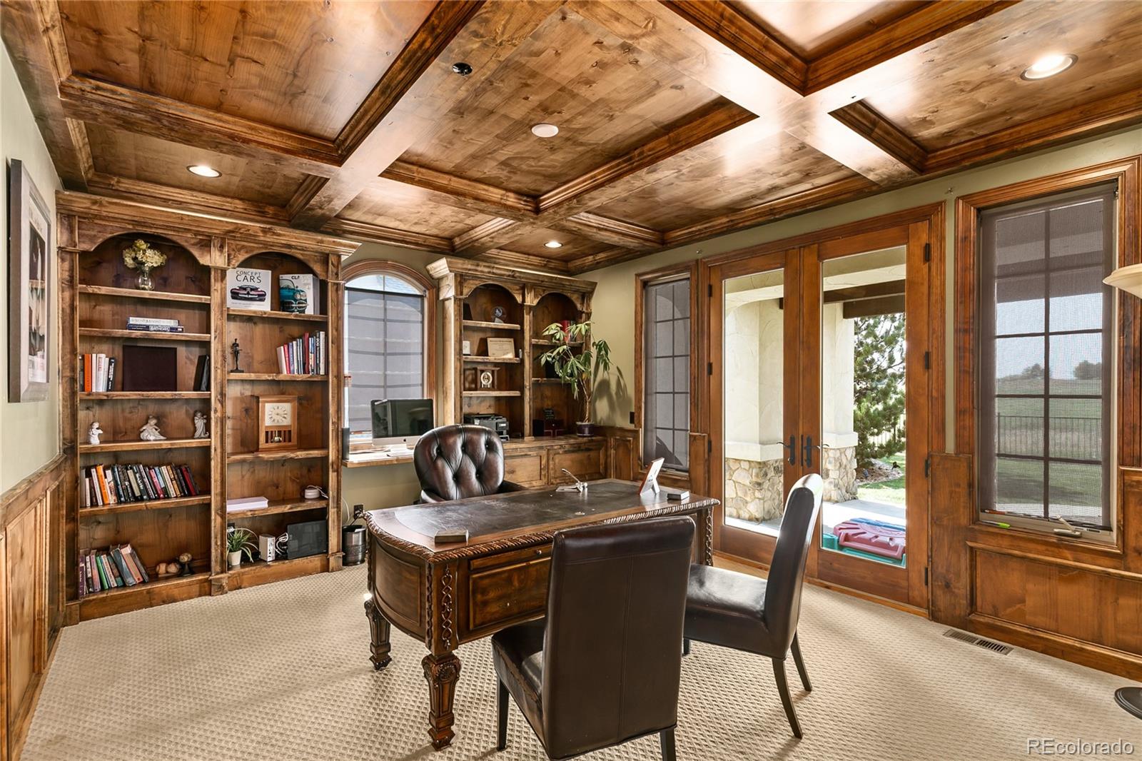 1295 Buffalo Ridge Road Castle Pines, CO 80108 - Photo 12 of 29 a work room with furniture