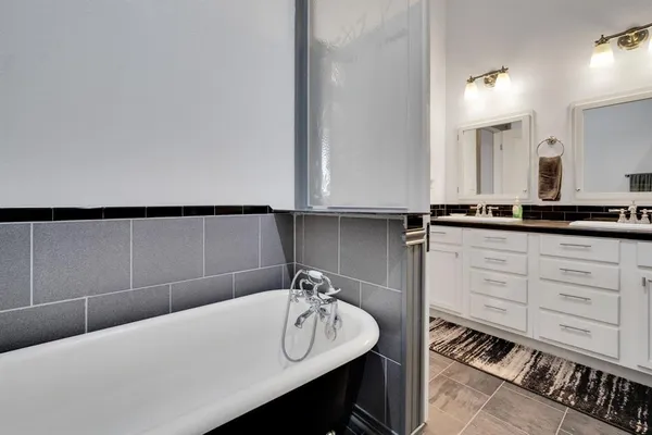 a bathroom with a sink and a bathtub