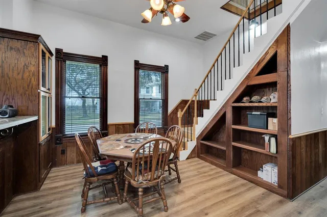 a kitchen with stainless steel appliances granite countertop wooden cabinets a sink and dishwasher