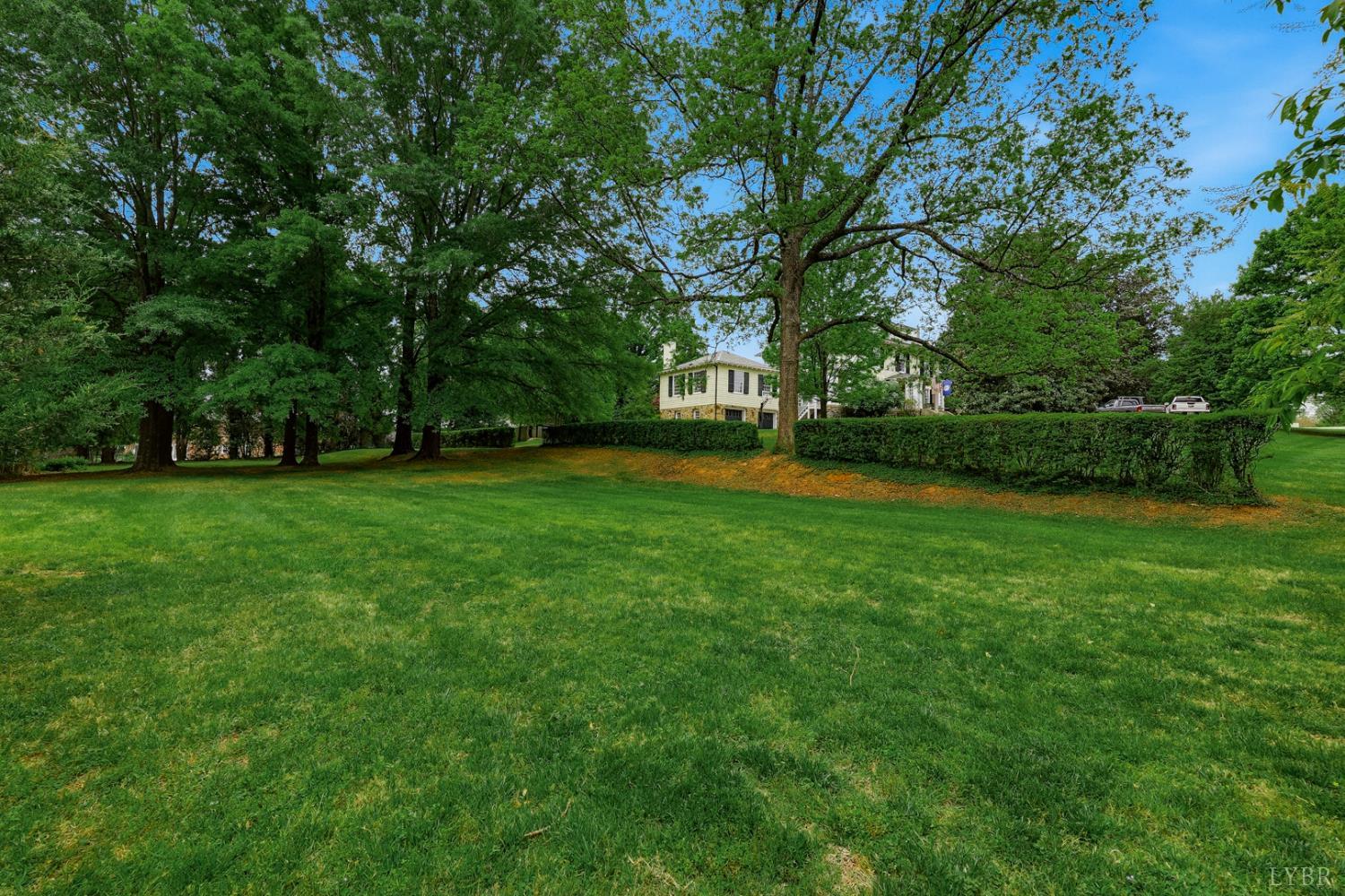 1304 Langhorne Road Lynchburg, VA 24503 - Photo 12 of 96 a view of a field of grass and trees