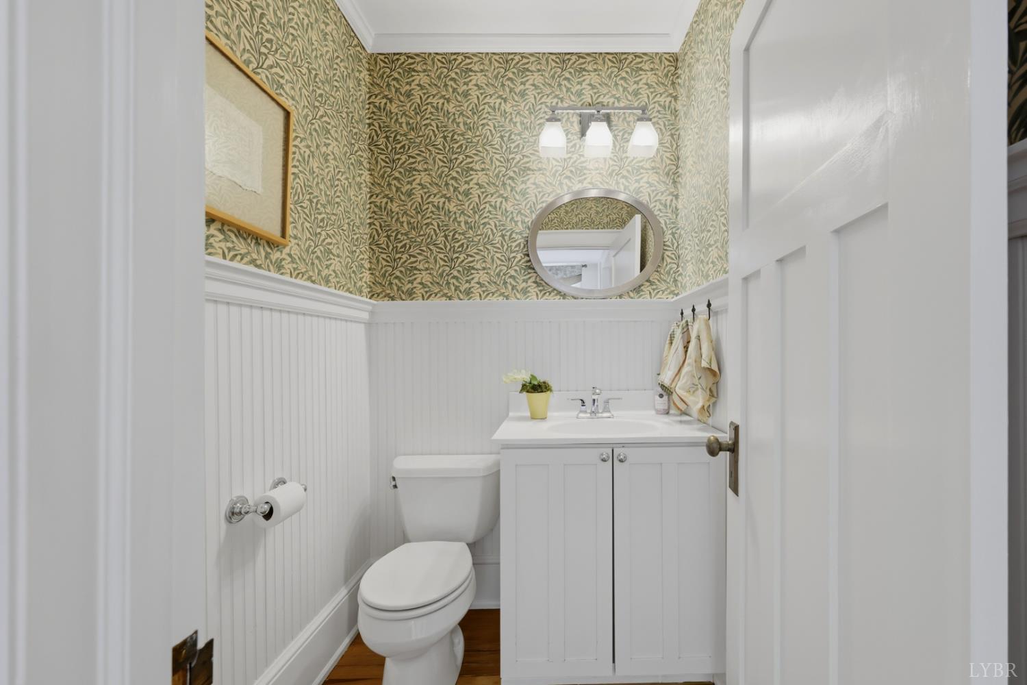 1304 Langhorne Road Lynchburg, VA 24503 - Photo 39 of 96 a bathroom with a toilet a sink and mirror