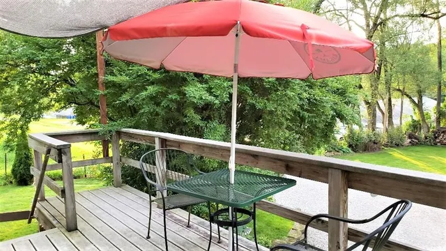 a front view of a house with patio