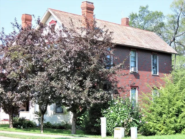 a view of a backyard with garden