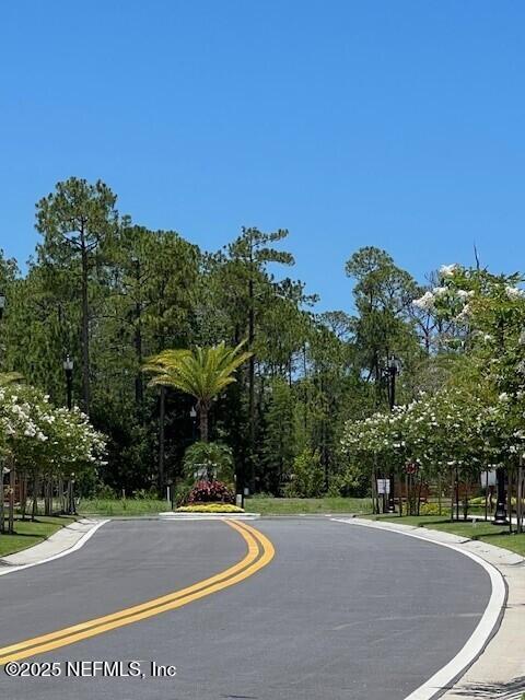 12 Mulberry Road Palm Coast, FL 32164 - Photo 42 of 47 Entrance with flowers
