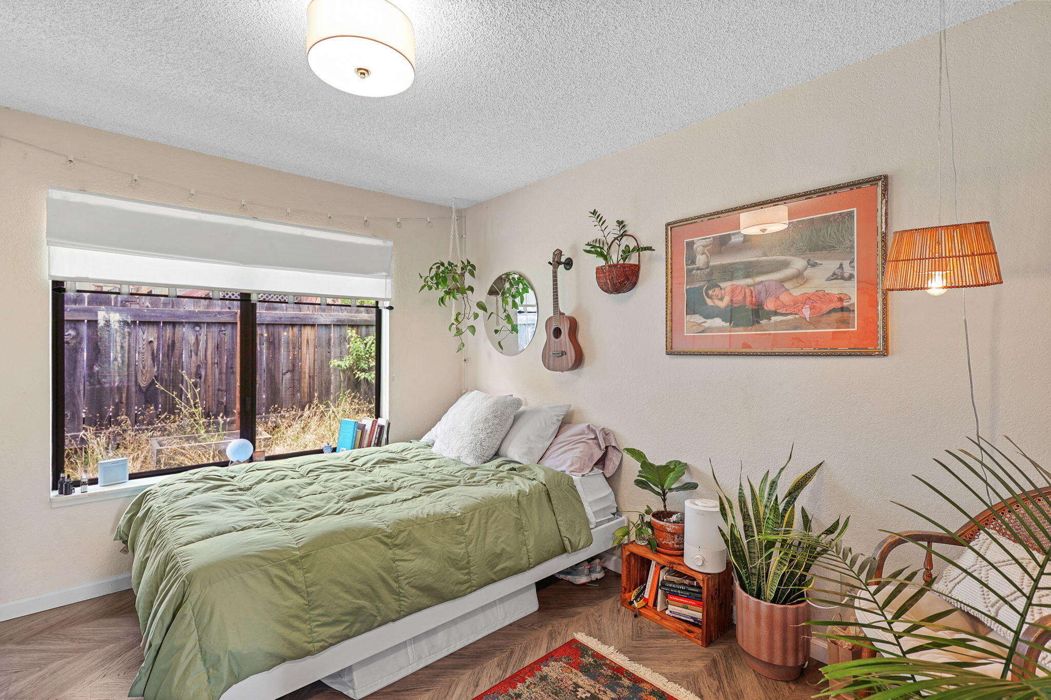 3718 Cal Ore Drive Redding, CA 96001 - Photo 17 of 28 a bedroom with a bed and a painting on the wall