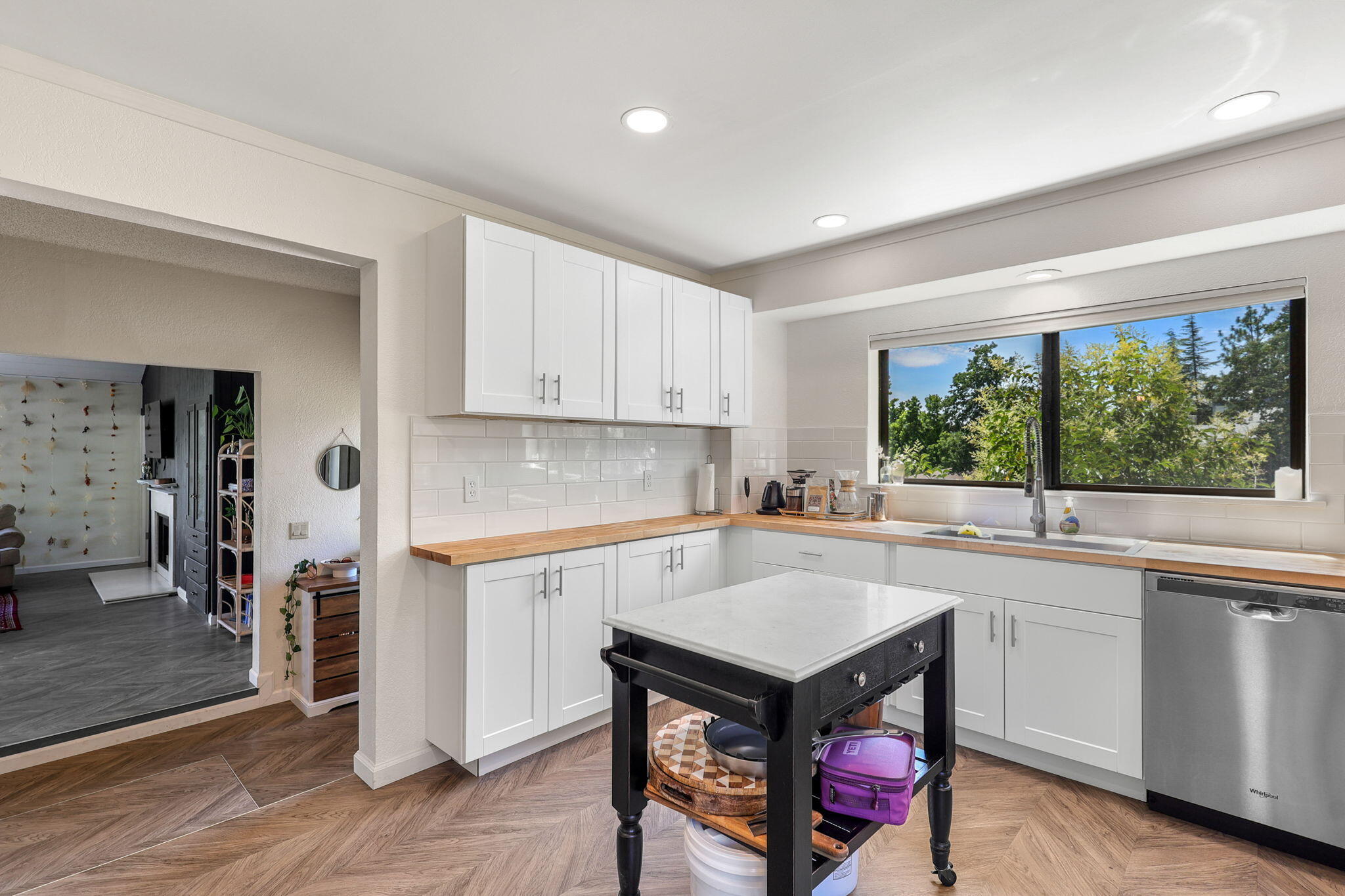 3718 Cal Ore Drive Redding, CA 96001 - Photo 6 of 28 a kitchen with a stove a sink and a refrigerator