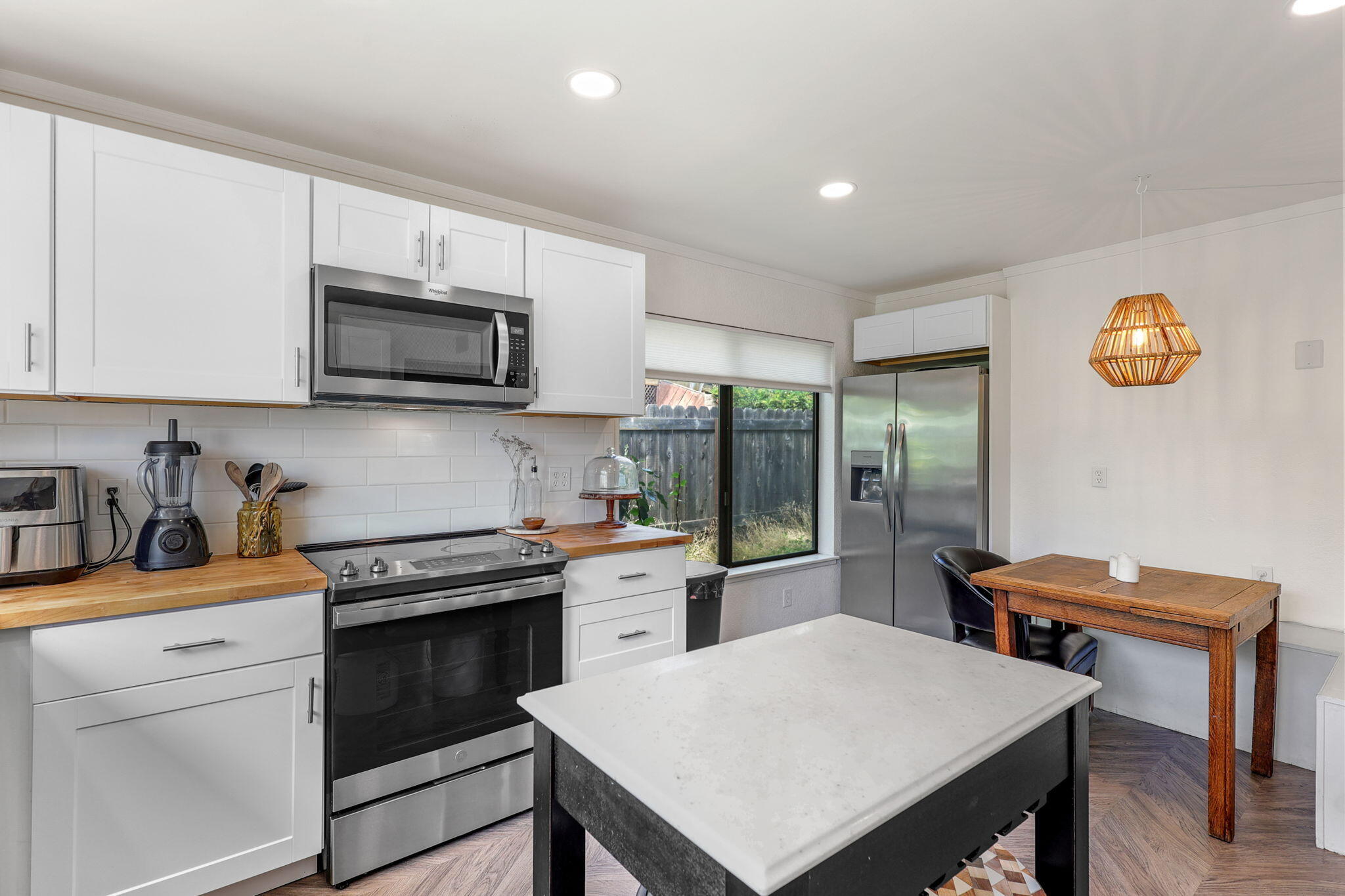 3718 Cal Ore Drive Redding, CA 96001 - Photo 9 of 28 a kitchen with a stove a sink and a refrigerator