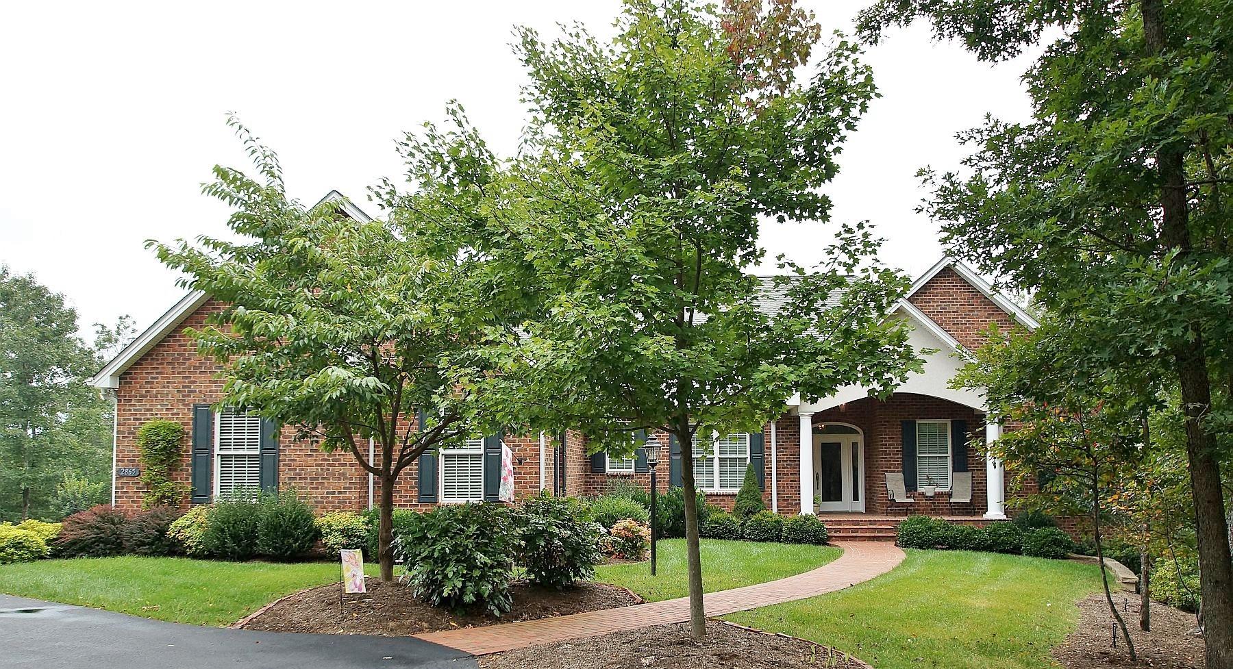 2865 New Ridge Road Elliston, VA 24087 - Photo 1 of 94 a front view of a house with a garden
