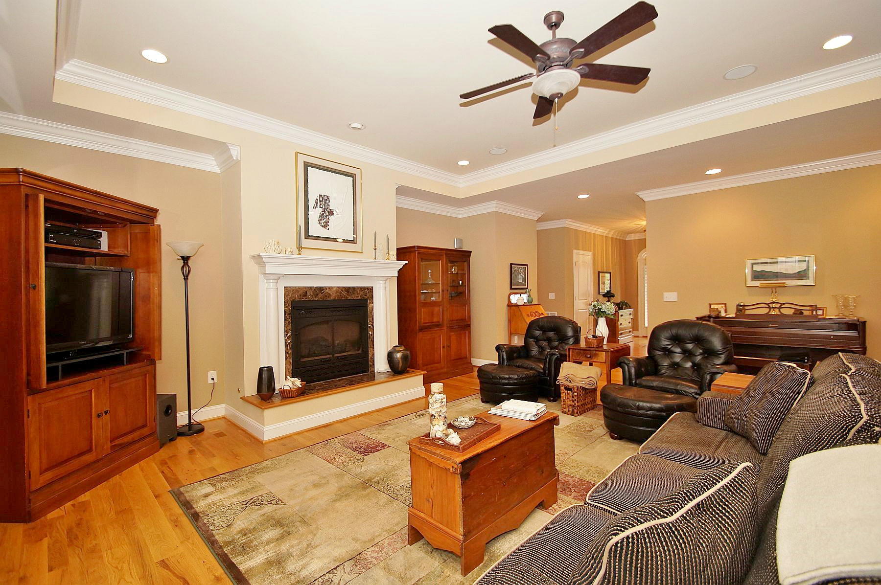 2865 New Ridge Road Elliston, VA 24087 - Photo 14 of 94 a living room with furniture a flat screen tv and a fireplace