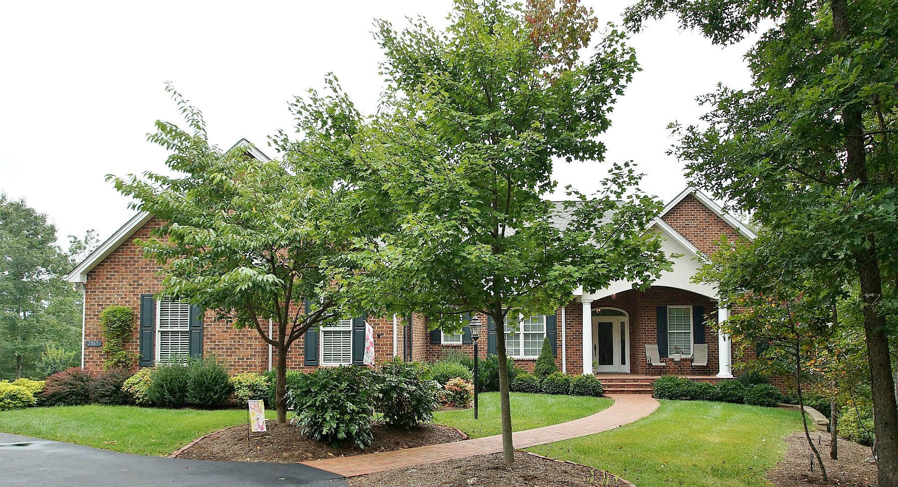2865 New Ridge Road Elliston, VA 24087 - Photo 4 of 94 a front view of a house with a garden