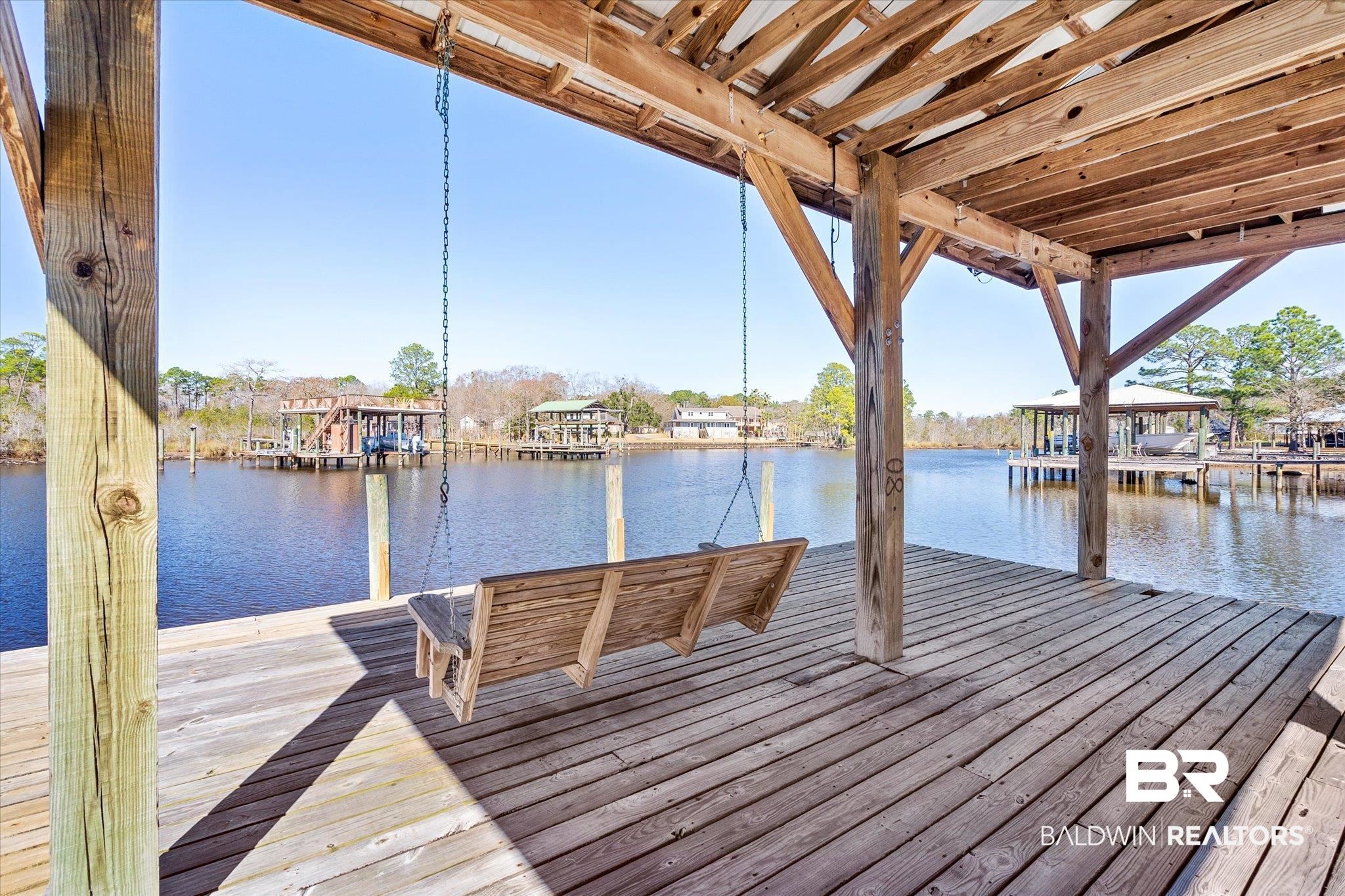 5683 Spring Landing Drive Theodore, AL 36582 - Photo 40 of 49 View of dock featuring a water view