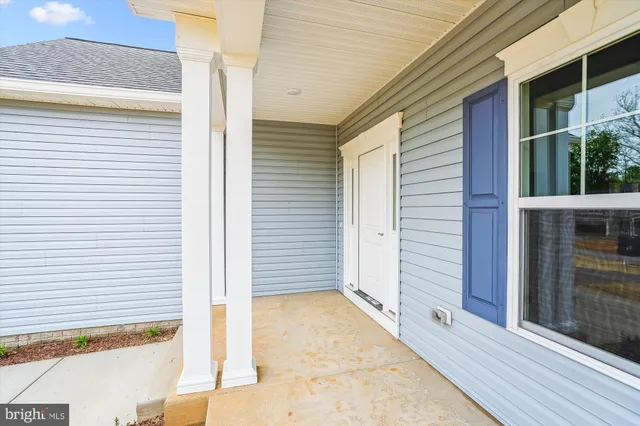 a view of a porch with garden
