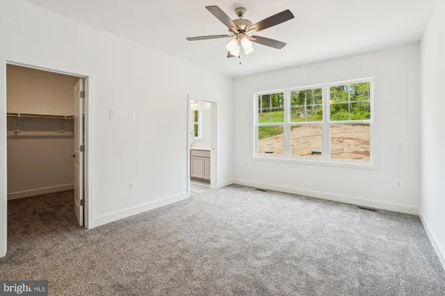 a bathroom with a sink double vanity and a mirror