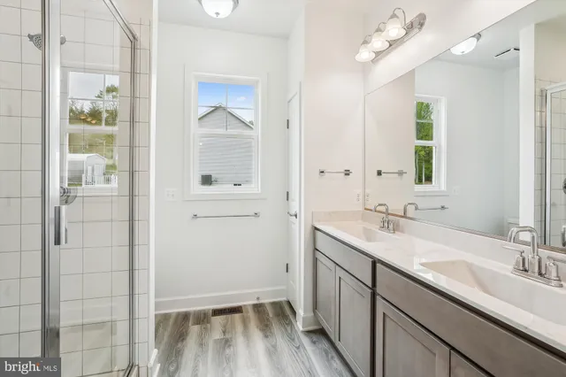 a bathroom with a toilet and shower