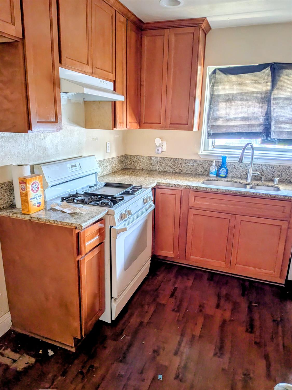 10517 Mills Acres Circle Rancho Cordova, CA 95670 - Photo 12 of 19 a kitchen with granite countertop cabinets stainless steel appliances and a sink