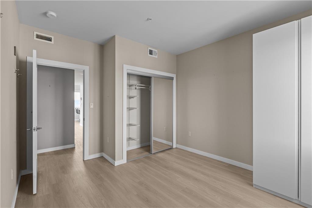 1825 Arcena Street, Unit 3 Pittsburgh, PA 15219 - Photo 15 of 31 wooden floor in an empty room