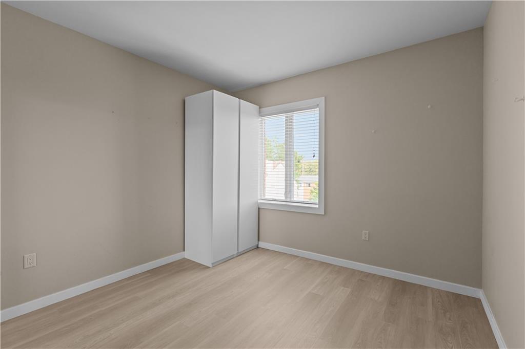 1825 Arcena Street, Unit 3 Pittsburgh, PA 15219 - Photo 16 of 31 an empty room with a window