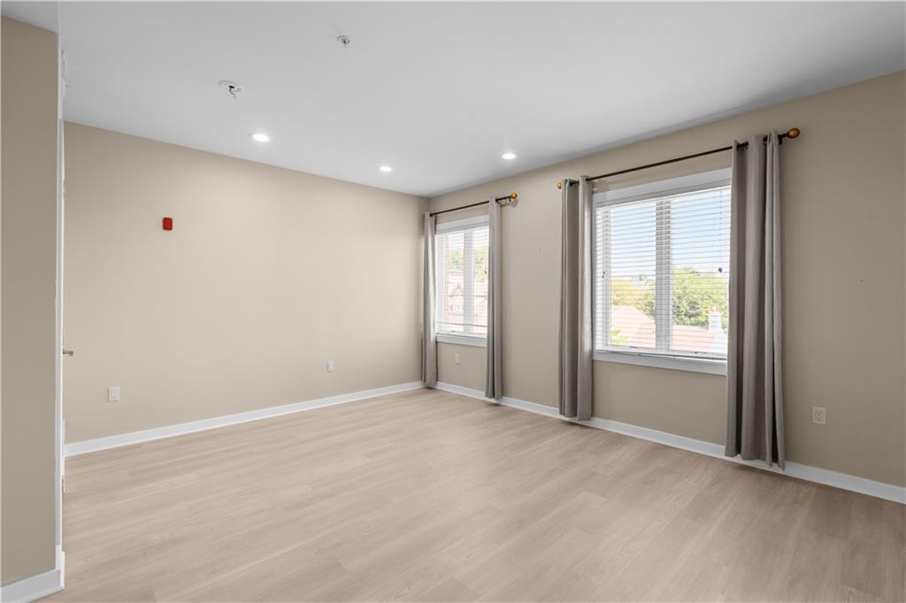 1825 Arcena Street, Unit 3 Pittsburgh, PA 15219 - Photo 19 of 31 a view of an empty room with a window