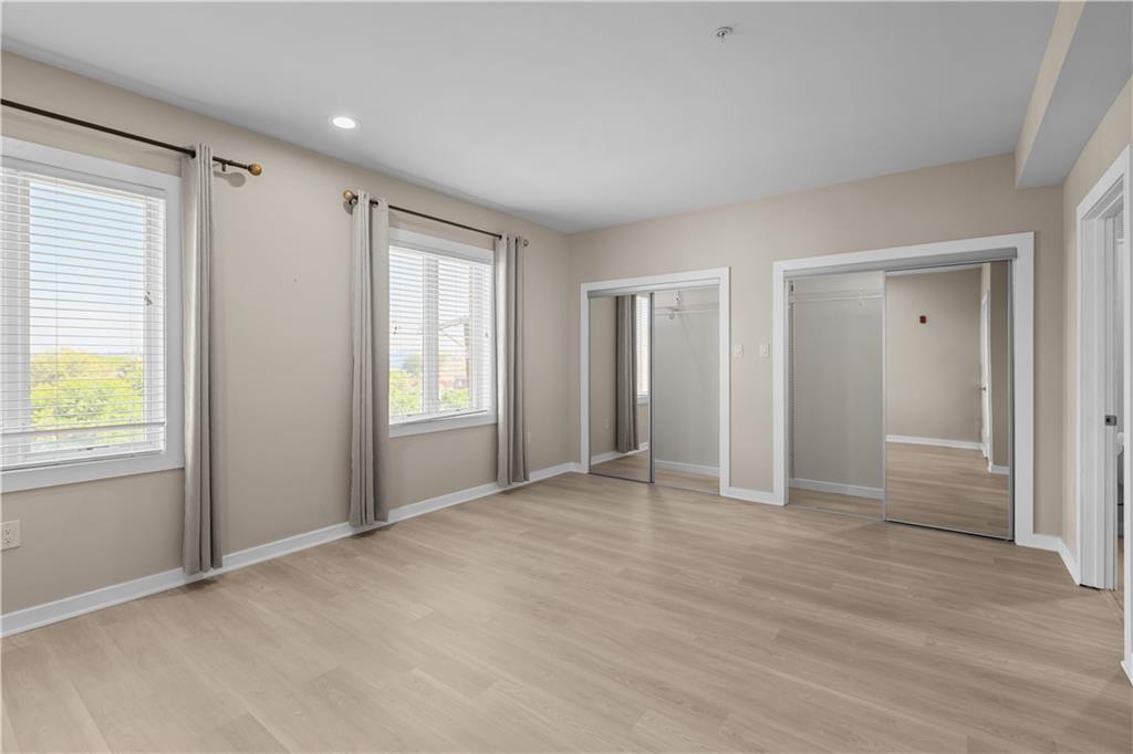 1825 Arcena Street, Unit 3 Pittsburgh, PA 15219 - Photo 20 of 31 a view of an empty room with closet and a window