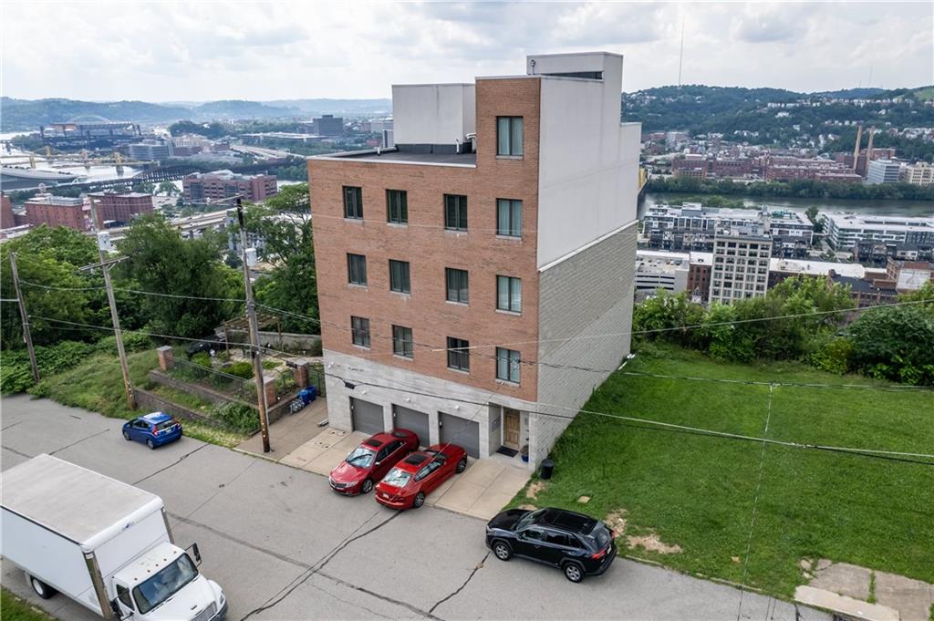1825 Arcena Street, Unit 3 Pittsburgh, PA 15219 - Photo 25 of 31 a view of building with outdoor space