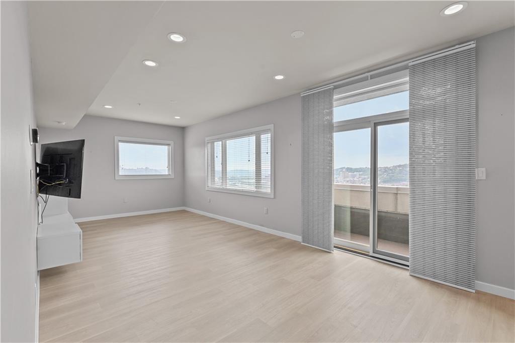 1825 Arcena Street, Unit 3 Pittsburgh, PA 15219 - Photo 6 of 31 a view of an empty room with a window