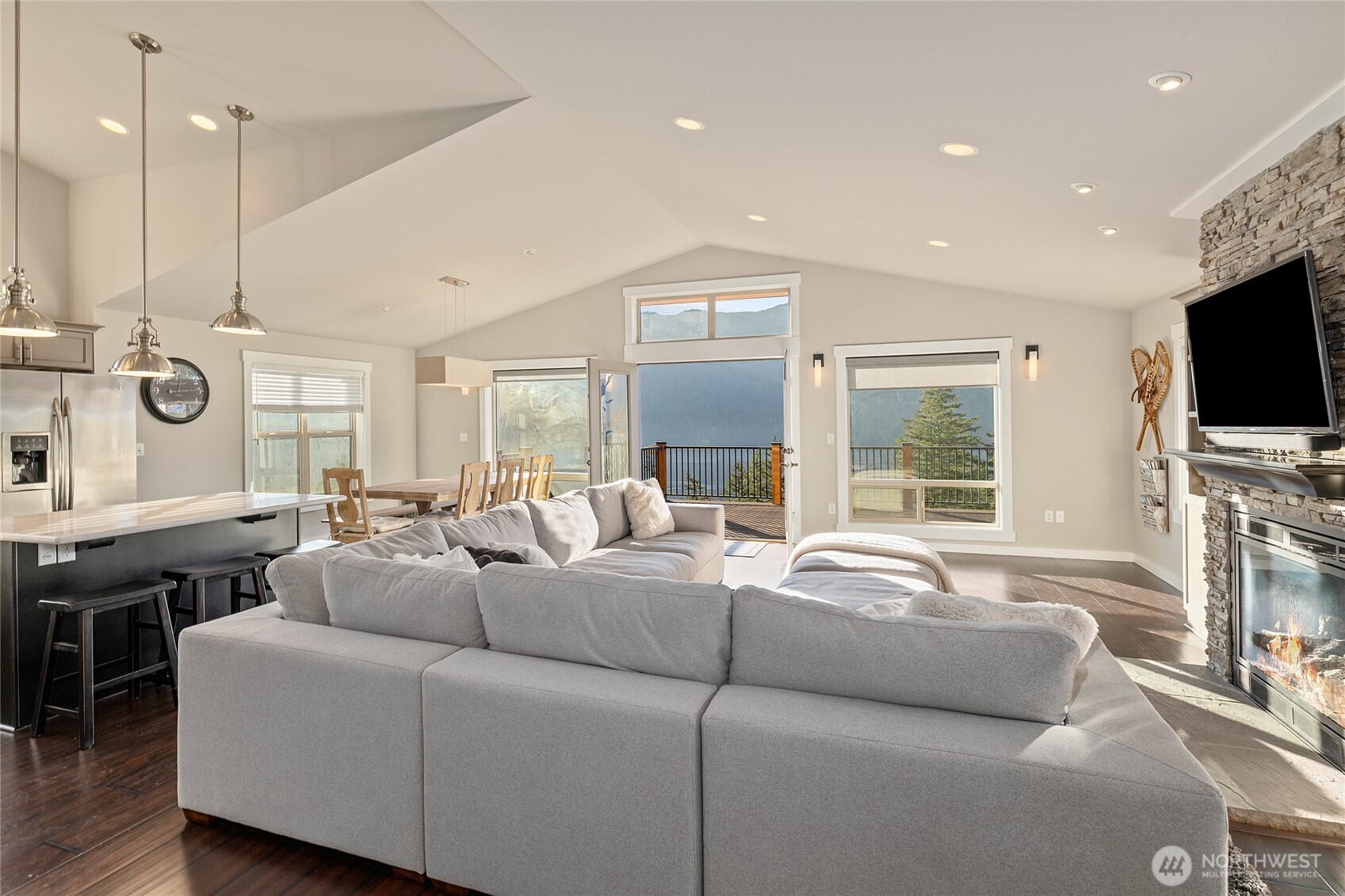 1840 Morgan Creek Road Ronald, WA 98940 - Photo 15 of 33 a living room with furniture a flat screen tv and a large window