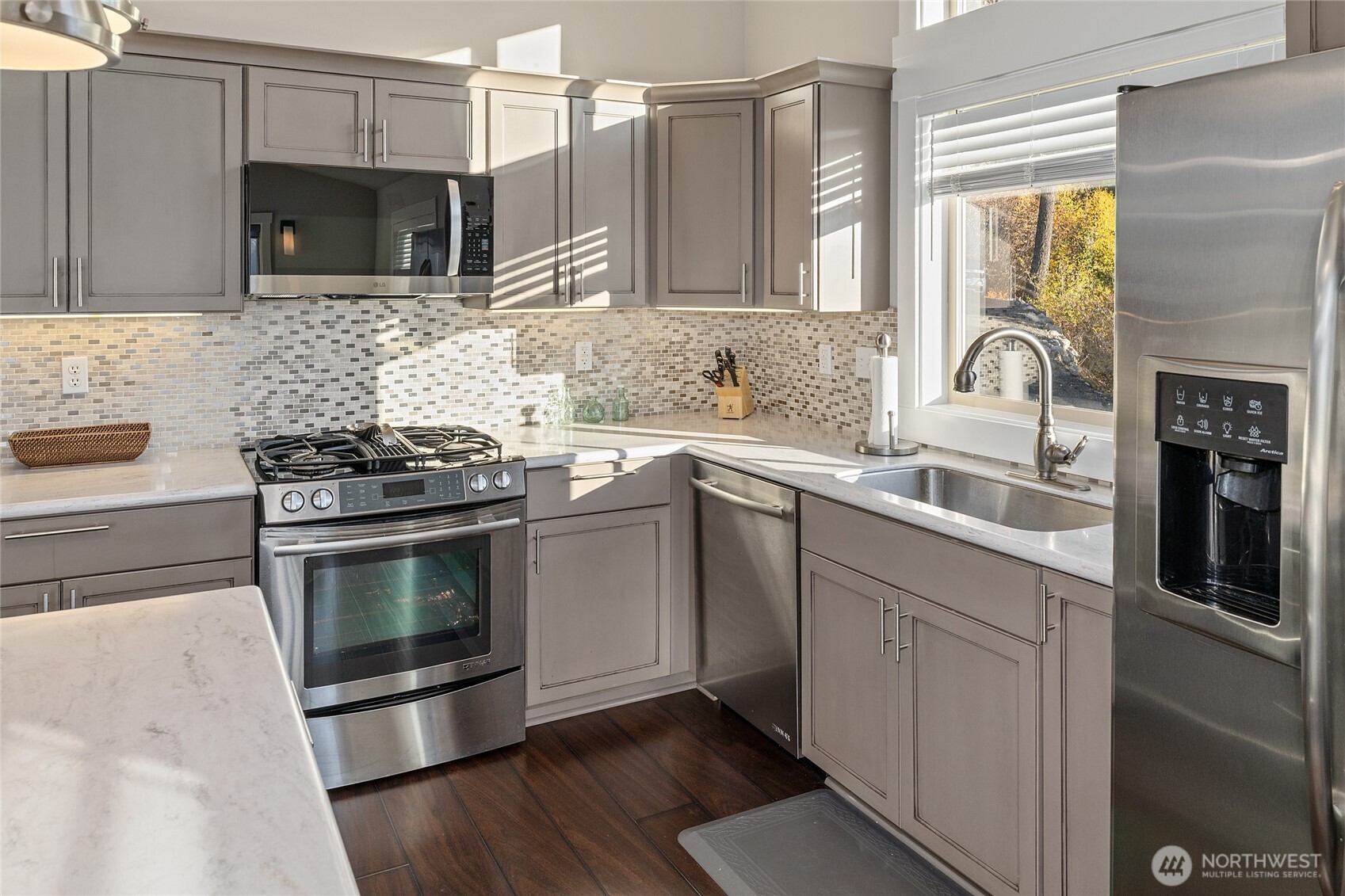 1840 Morgan Creek Road Ronald, WA 98940 - Photo 24 of 33 a kitchen with stainless steel appliances a stove sink and microwave