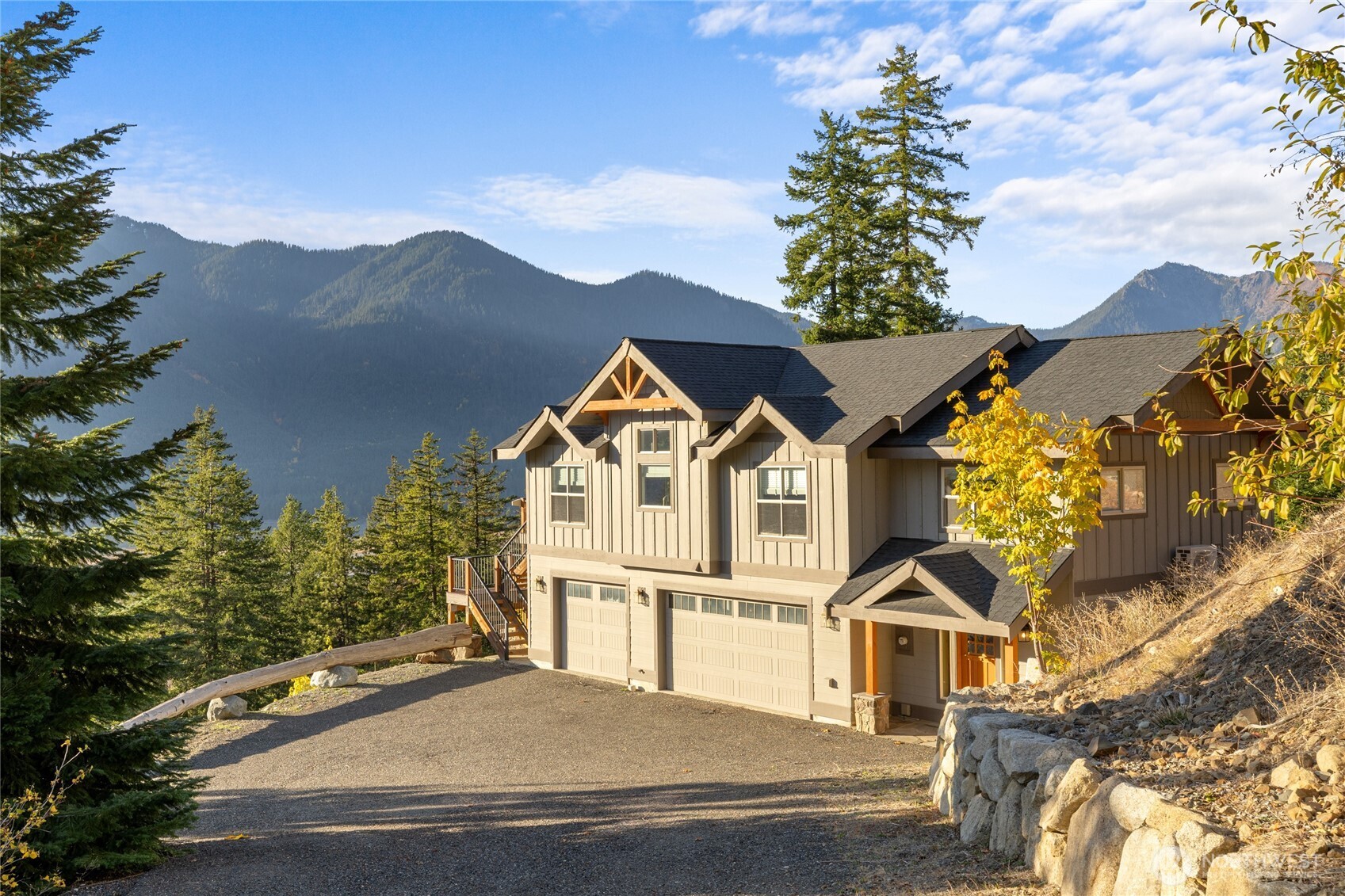 1840 Morgan Creek Road Ronald, WA 98940 - Photo 3 of 33 a view of a house with a yard and potted plants