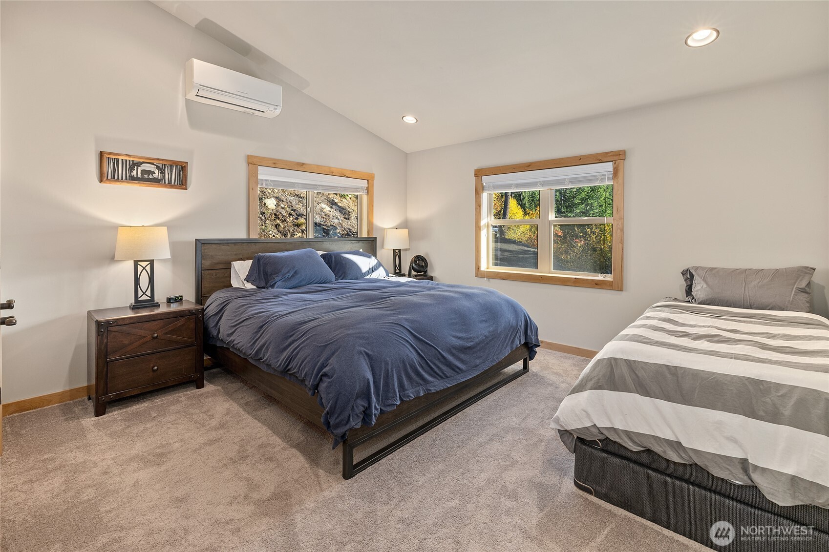 1840 Morgan Creek Road Ronald, WA 98940 - Photo 10 of 33 a spacious bedroom with a large bed and a window