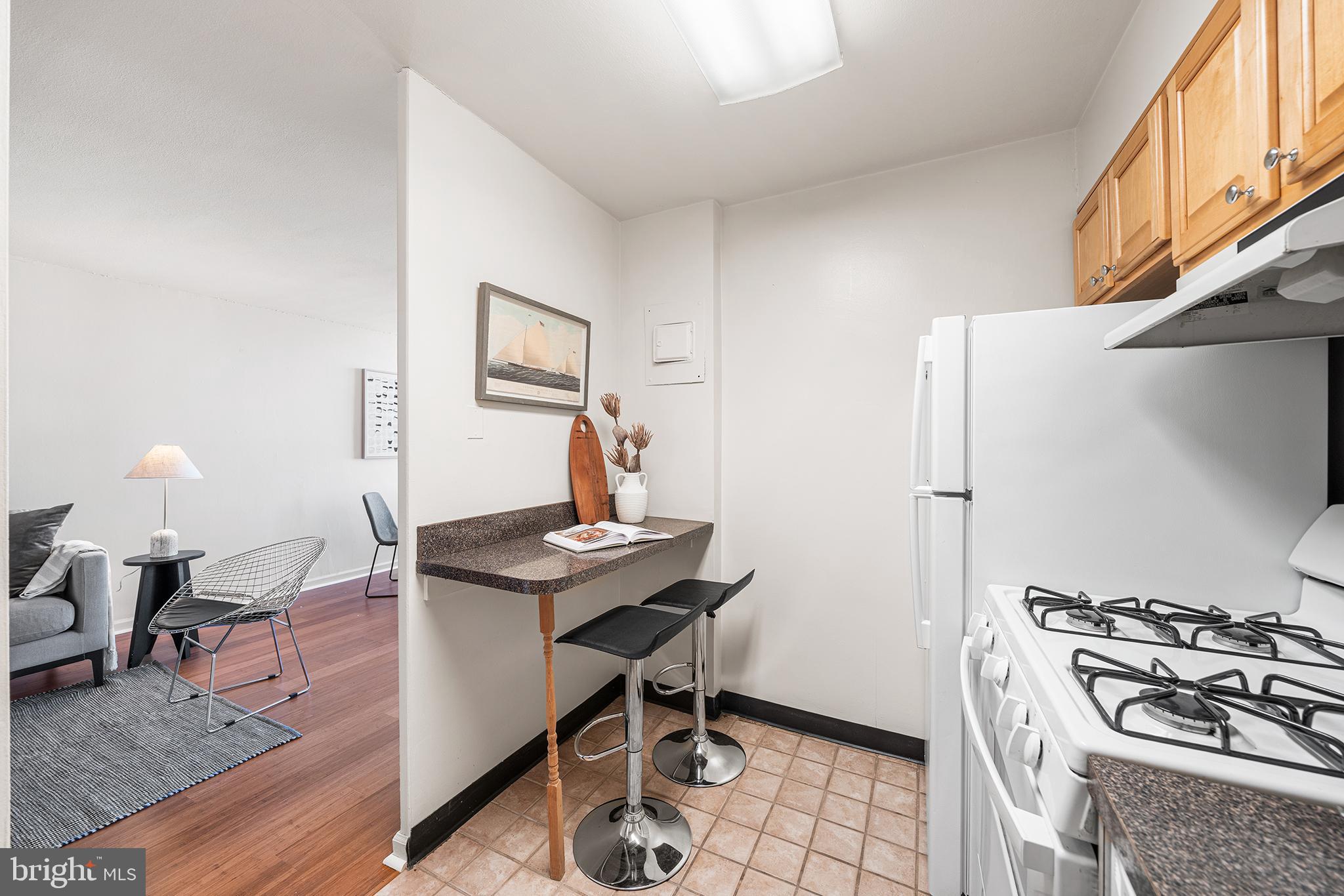 604 South Washington Square, Unit 2606 Philadelphia, PA 19106 - Photo 20 of 37 a view of a workspace with furniture