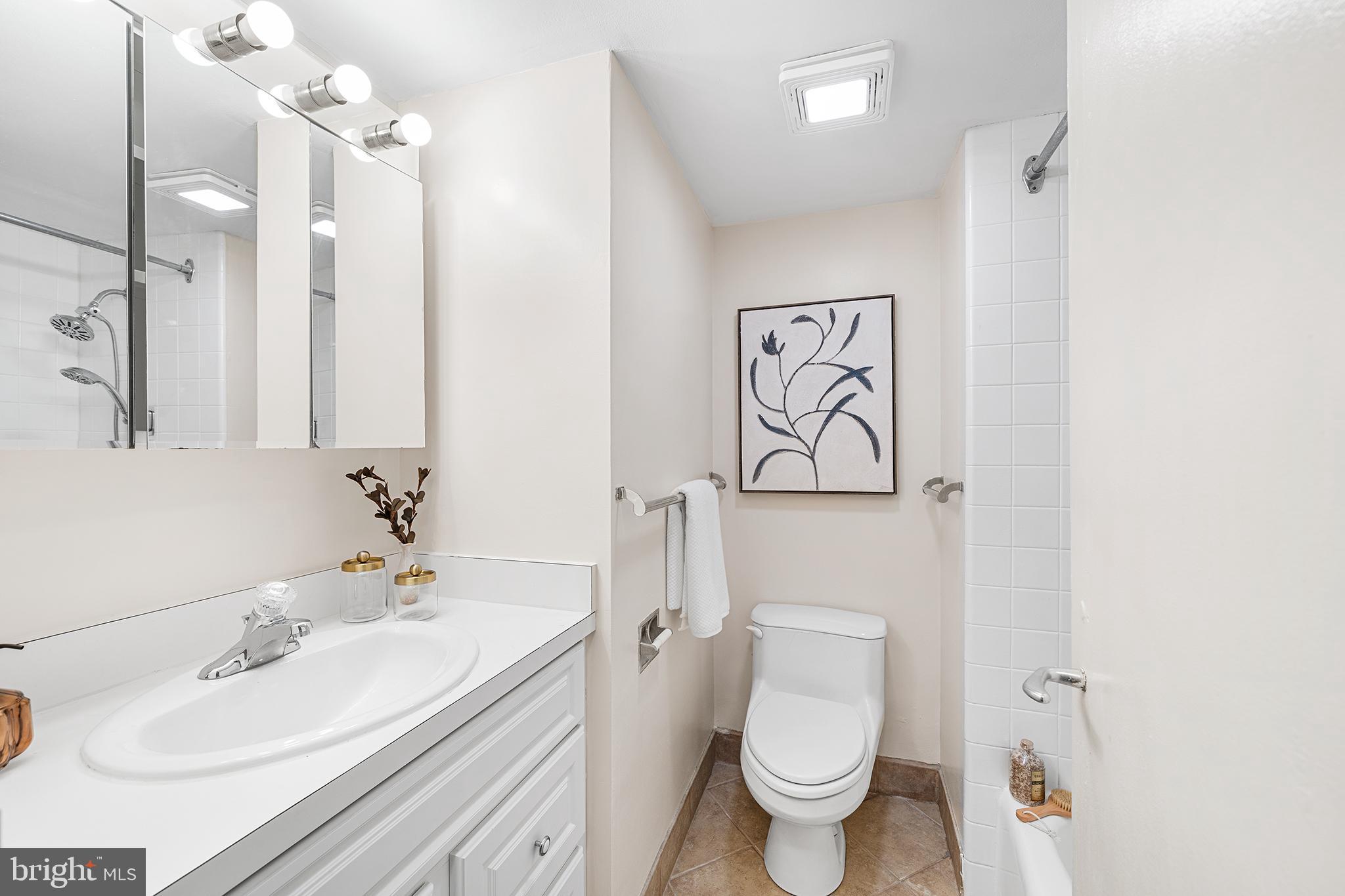 604 South Washington Square, Unit 2606 Philadelphia, PA 19106 - Photo 25 of 37 a bathroom with a sink toilet and shower