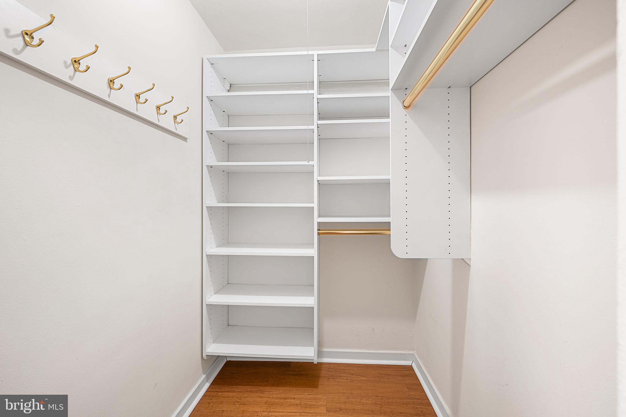 604 South Washington Square, Unit 2606 Philadelphia, PA 19106 - Photo 26 of 37 a view of walk in closet with empty racks