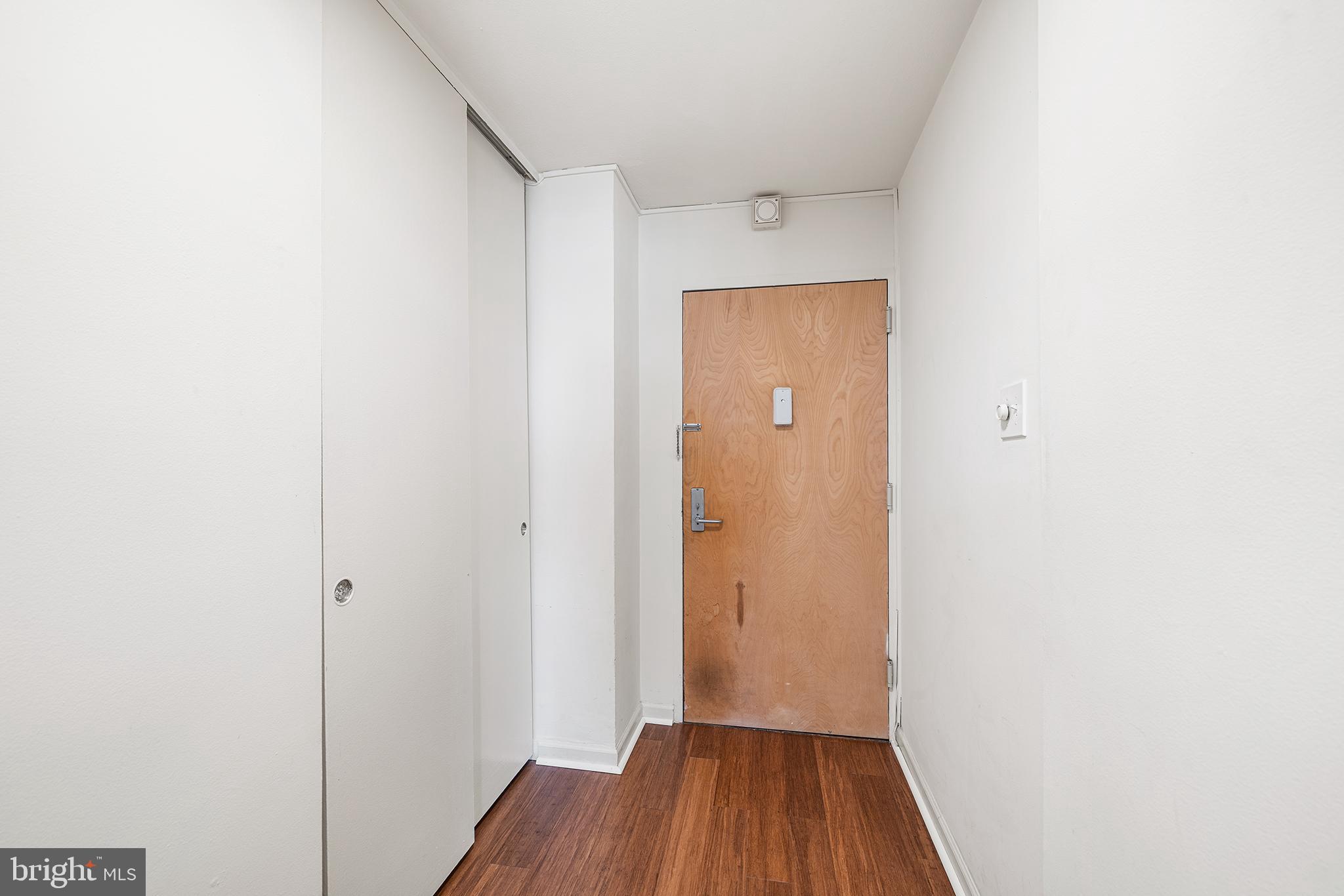 604 South Washington Square, Unit 2606 Philadelphia, PA 19106 - Photo 27 of 37 a view of a hallway with wooden floor