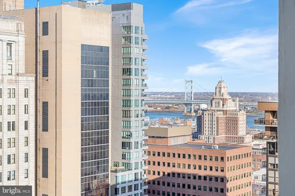 a view of a city with tall buildings
