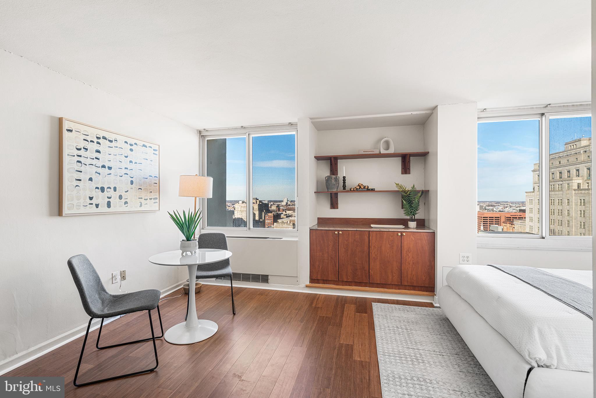 604 South Washington Square, Unit 2606 Philadelphia, PA 19106 - Photo 5 of 37 a living room with furniture and a wooden floor