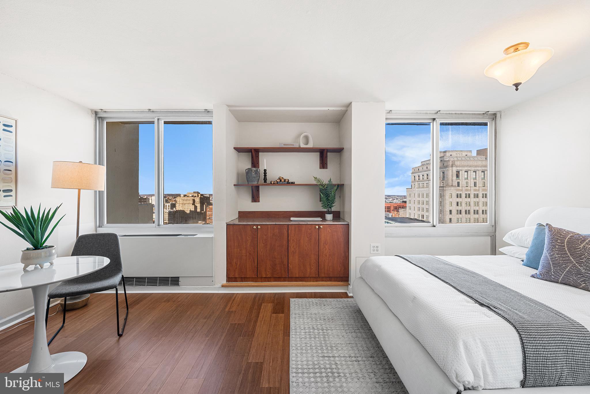 604 South Washington Square, Unit 2606 Philadelphia, PA 19106 - Photo 9 of 37 a bedroom with a bed and a dresser
