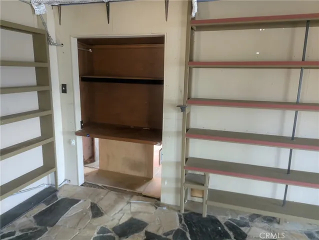 a view of entryway with a door