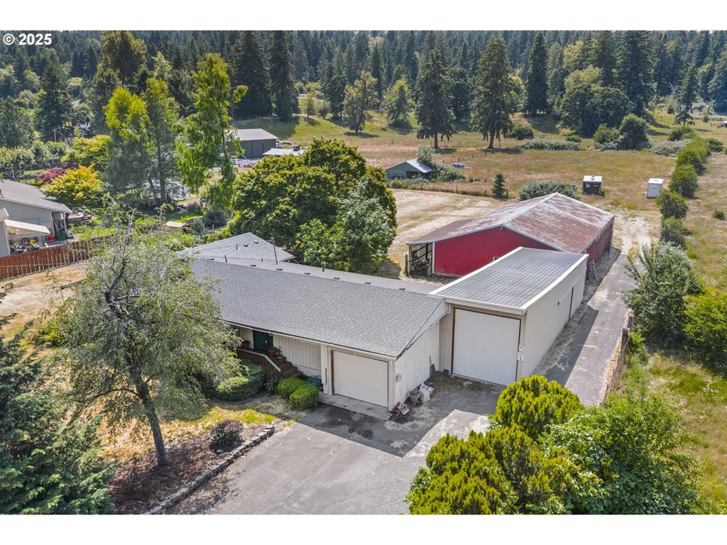 15317 South Hattan Road Oregon City, OR 97045 - Photo 1 of 44 a aerial view of a house with a yard