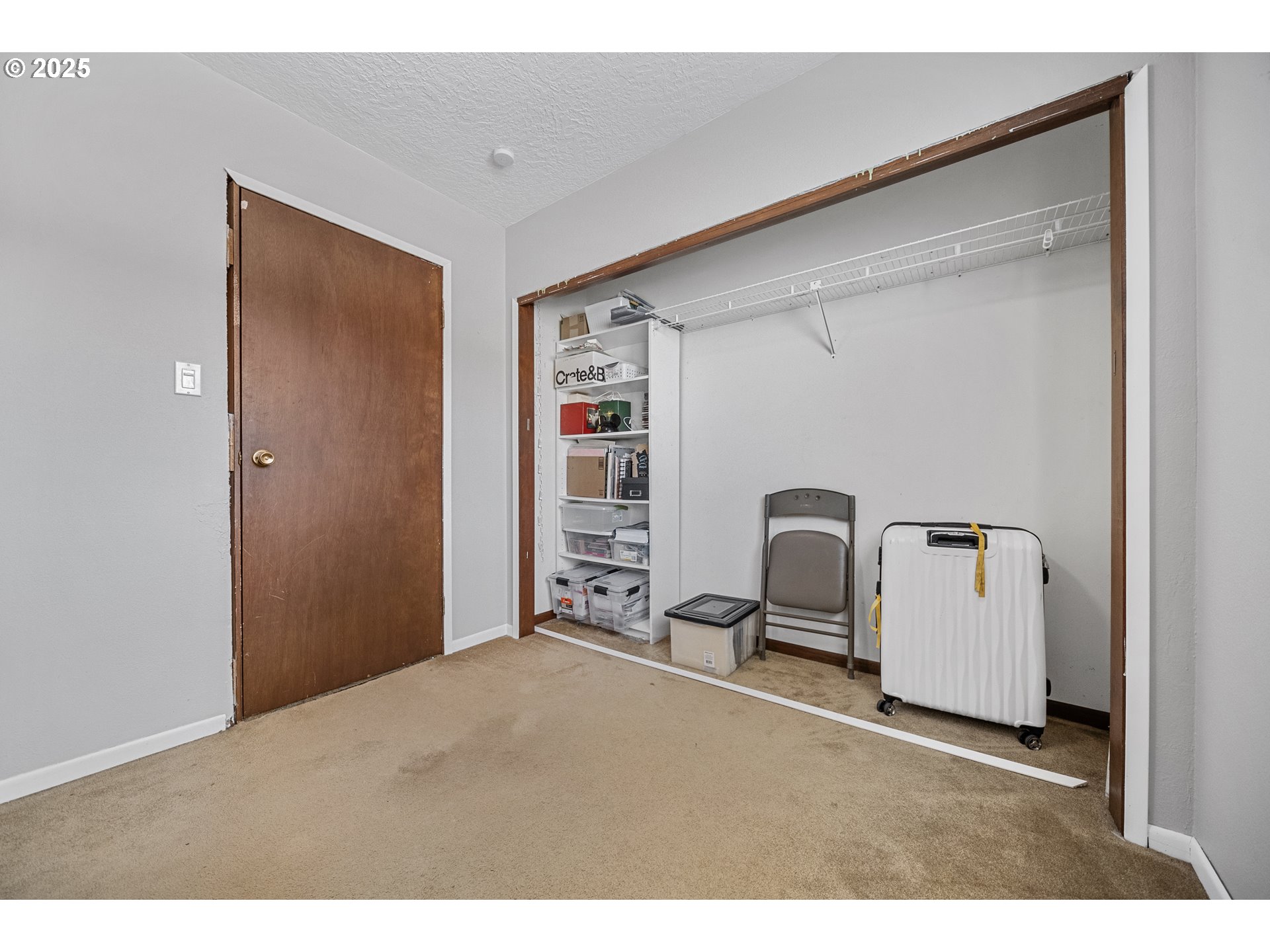 15317 South Hattan Road Oregon City, OR 97045 - Photo 21 of 44 a bedroom with a bed and a large mirror