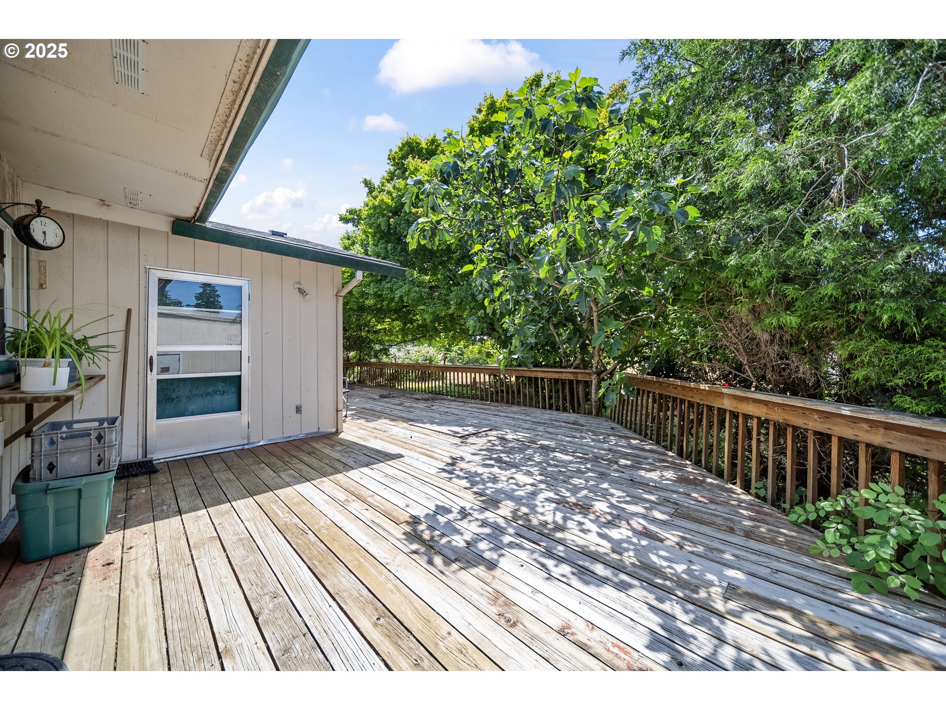 15317 South Hattan Road Oregon City, OR 97045 - Photo 27 of 44 a view of backyard with wooden floor and fence