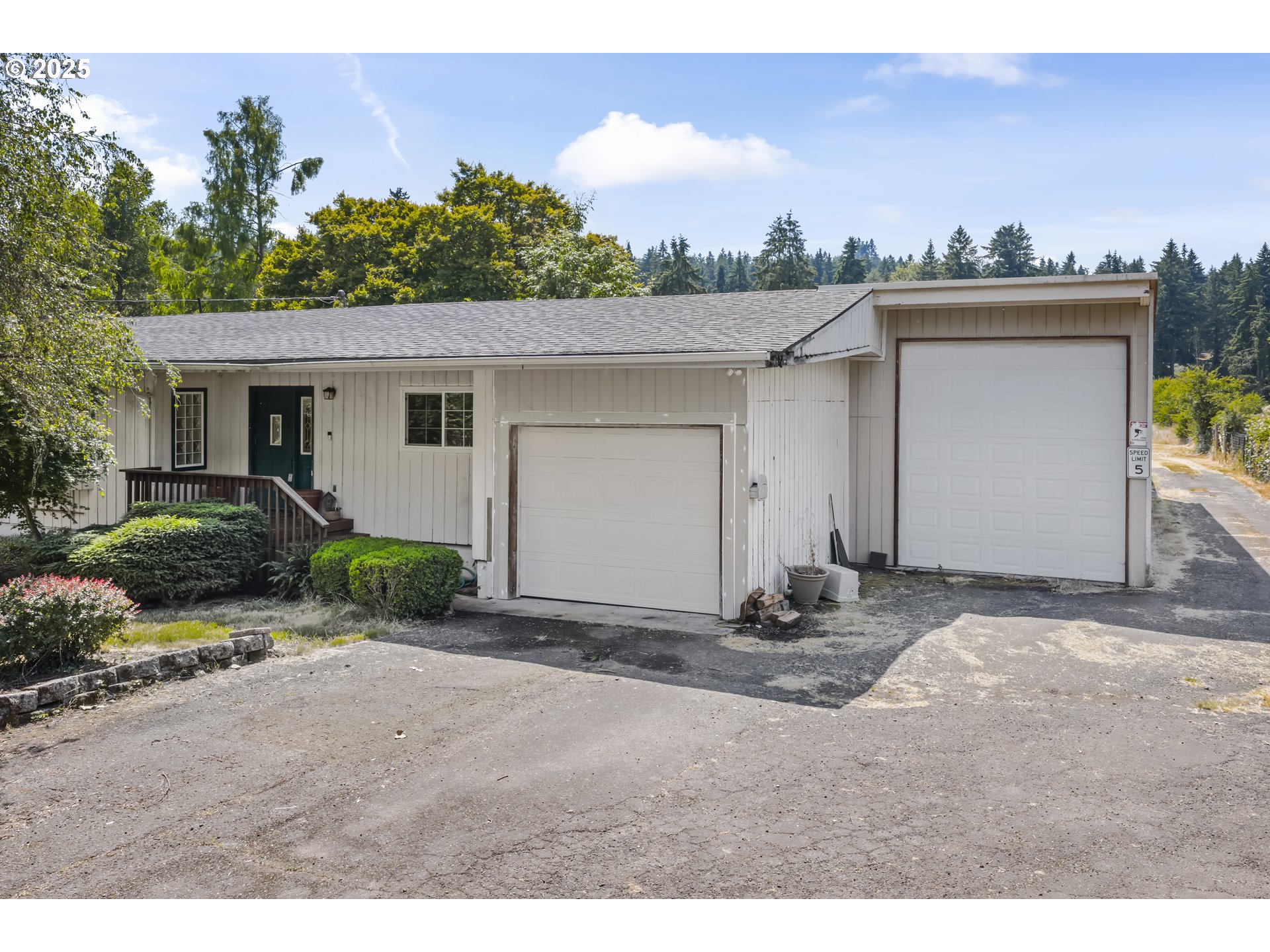 15317 South Hattan Road Oregon City, OR 97045 - Photo 3 of 44 a view of a house with a outdoor space