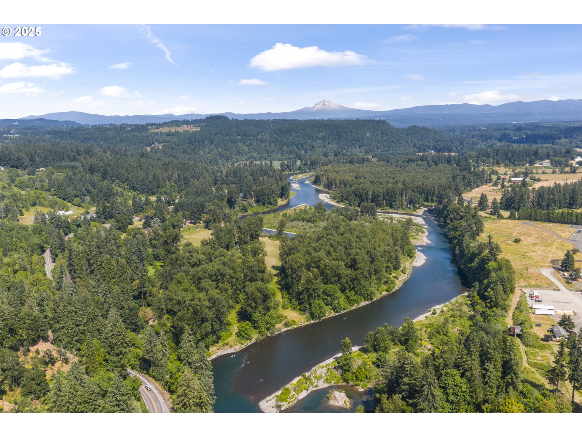 15317 South Hattan Road Oregon City, OR 97045 - Photo 43 of 44 a view of a city with mountains in the background