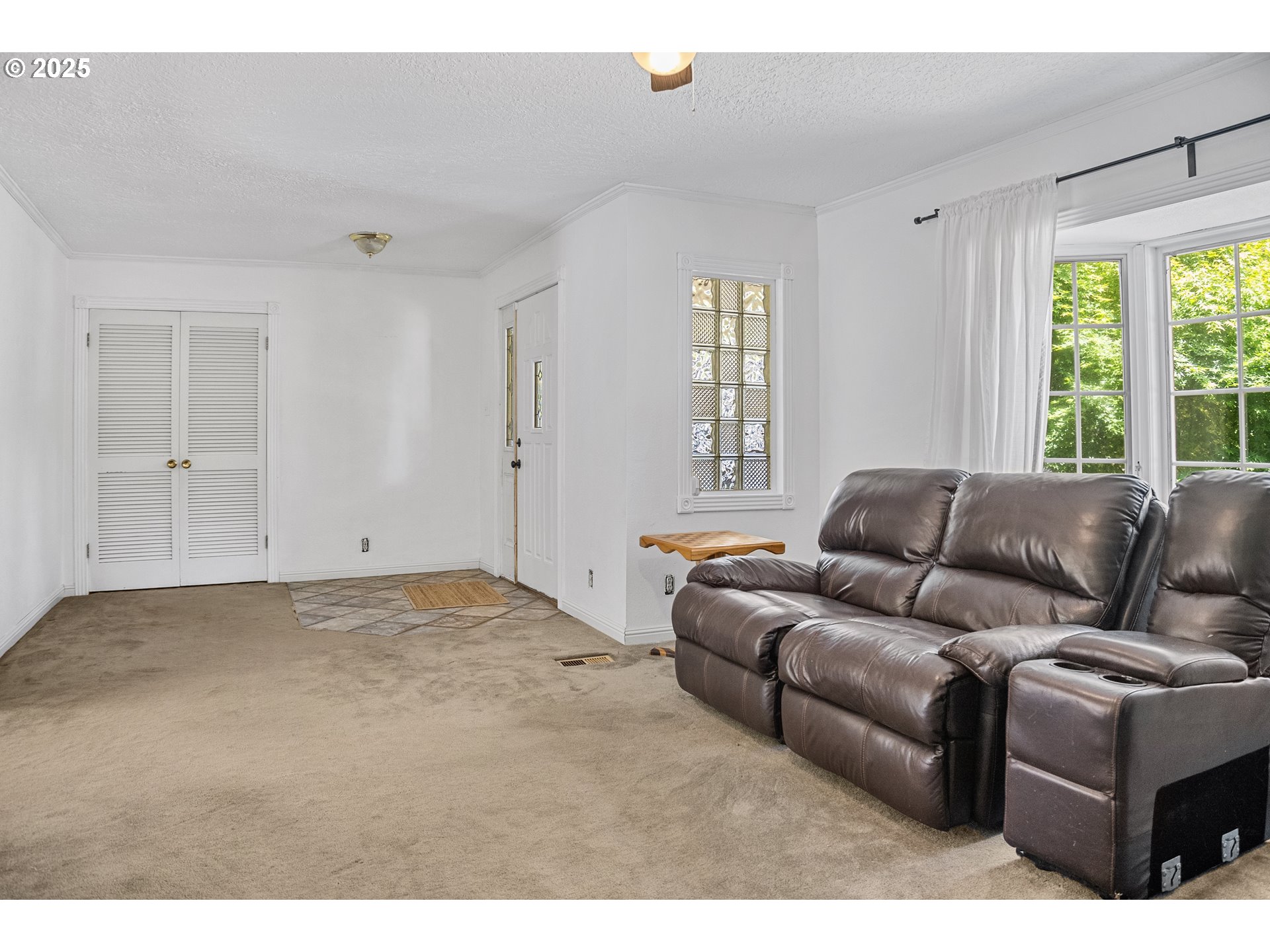 15317 South Hattan Road Oregon City, OR 97045 - Photo 6 of 44 a living room with furniture and window