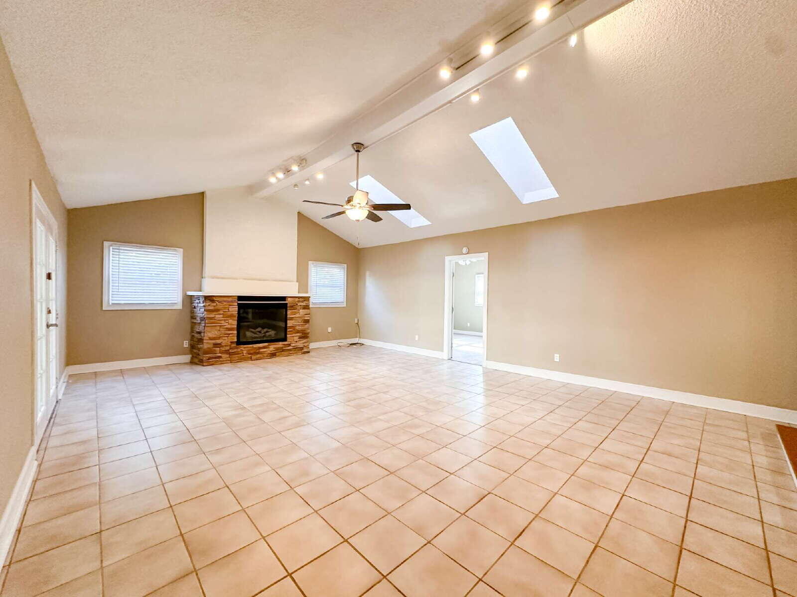 2614 32nd Street Lubbock, TX 79410 - Photo 20 of 37 a view of a livingroom with furniture and a ceiling fan