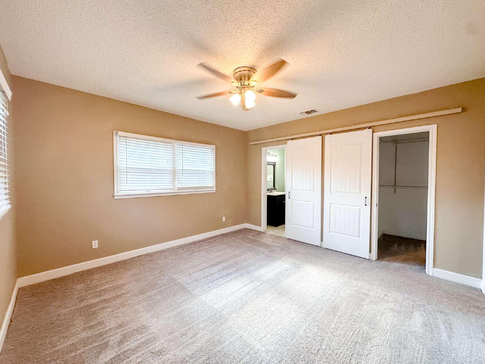 2614 32nd Street Lubbock, TX 79410 - Photo 25 of 37 a view of an empty room with a window