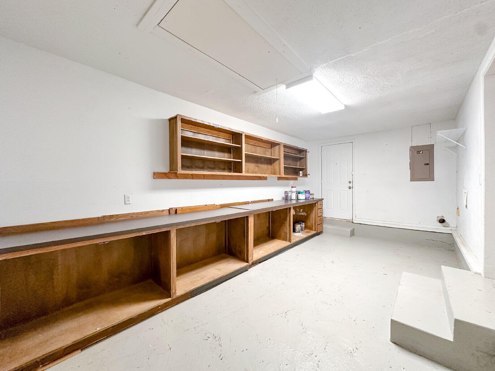 2614 32nd Street Lubbock, TX 79410 - Photo 36 of 37 a kitchen with stainless steel appliances a stove and cabinets
