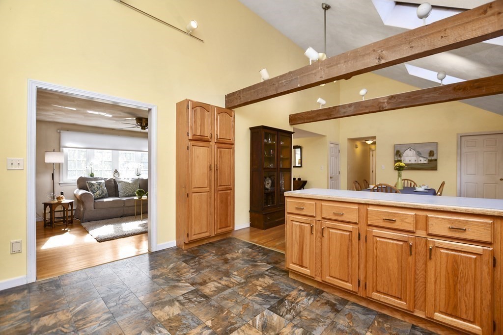 0 Cedar Street Burlington, MA 01803 - Photo 15 of 30 a spacious bathroom with a sink and a large mirror