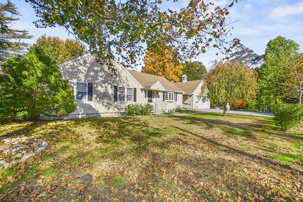 0 Cedar Street Burlington, MA 01803 - Photo 2 of 30 a house with trees in front of it